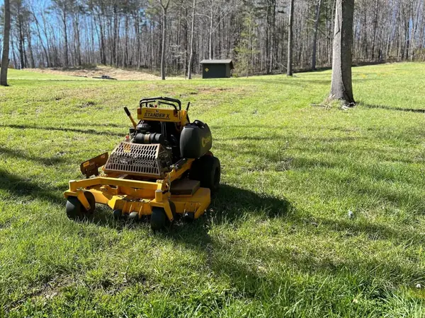 Fall leaf cleanup with truck and trailer